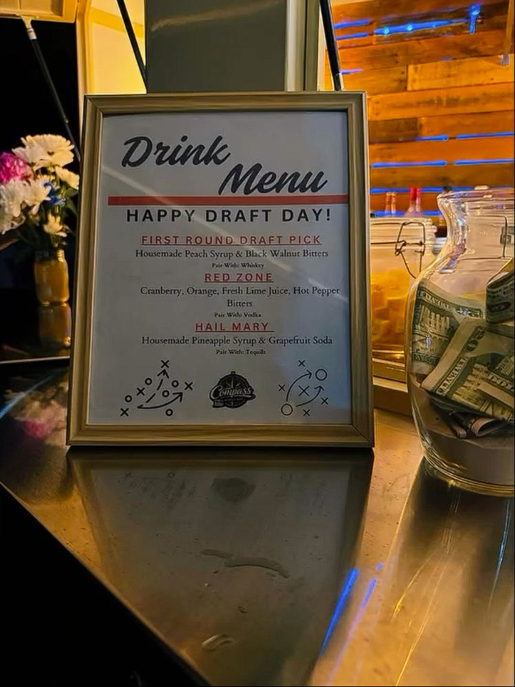 Framed Happy Draft Day drink menu with the First Round Draft Pick, Red Zone, and Hail Mary cocktails
