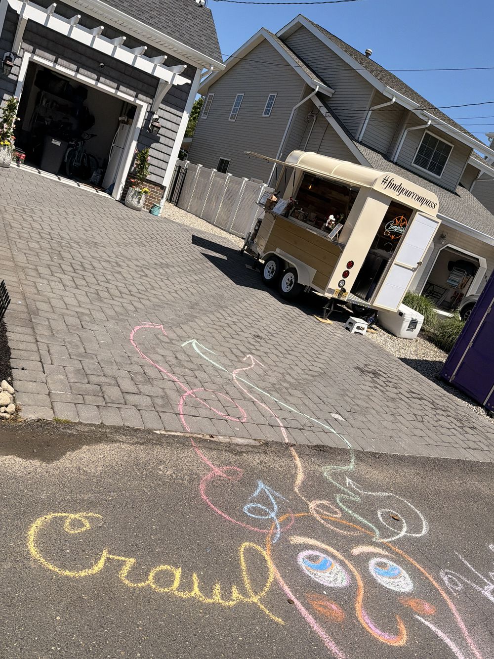 Chalk arrows on the pavement pointing the way during the Manasquan house crawl