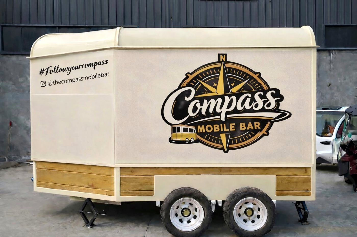 Rear of the trailer with the Compass Mobile Bar logo