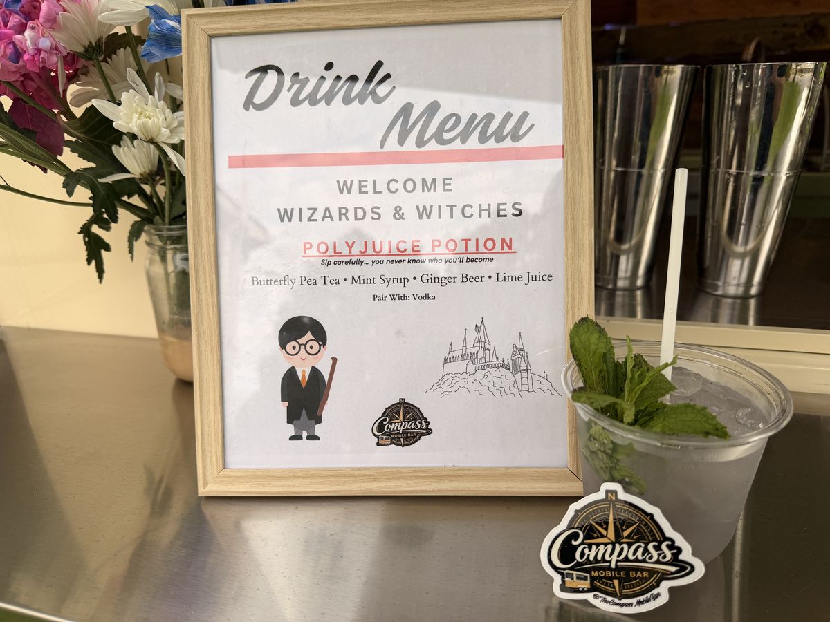 Framed wizard themed drink menu featuring the color changing Polyjuice Potion cocktail